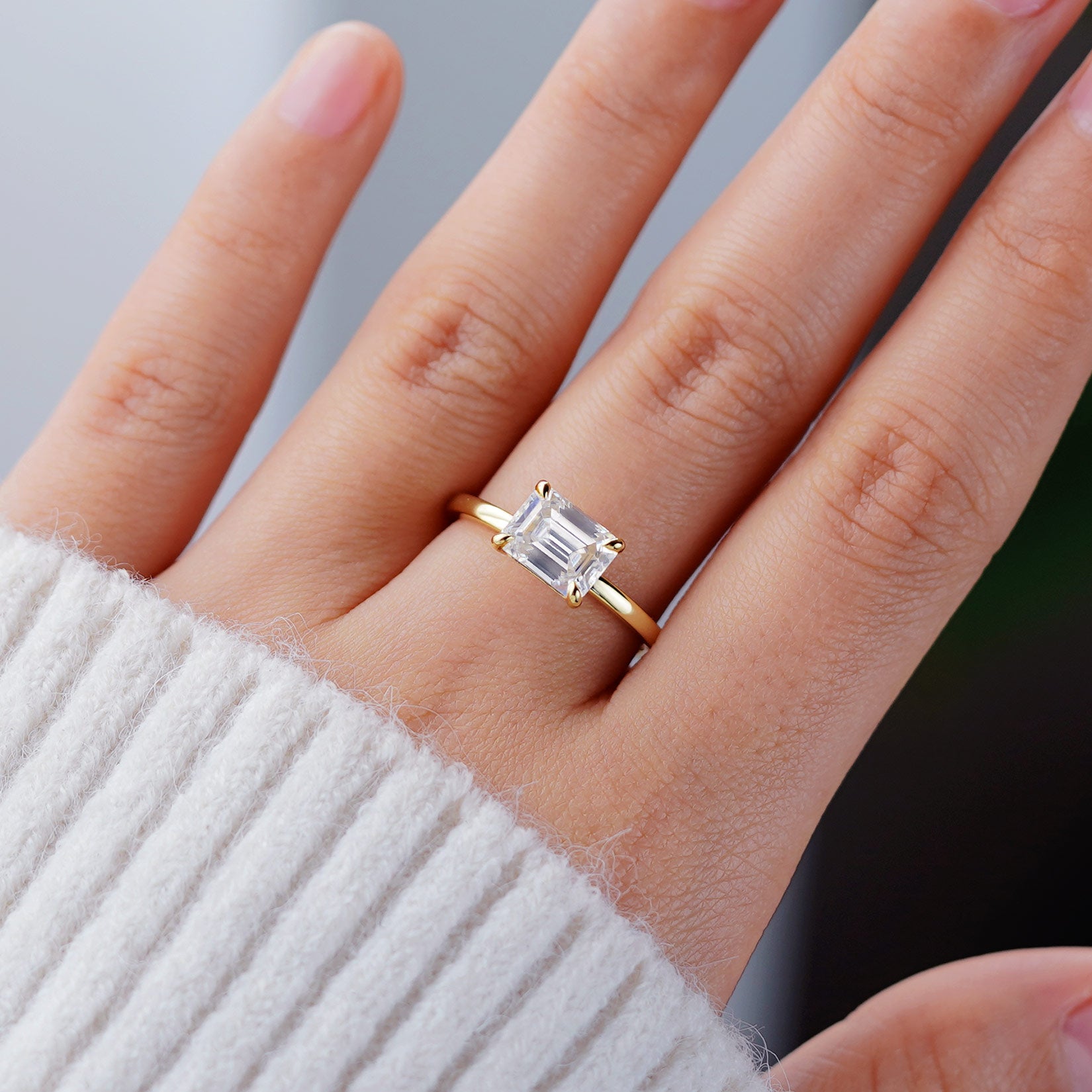 East-West Emerald Cut Solitaire Engagement Ring