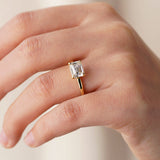 East-West Emerald Cut Solitaire Engagement Ring