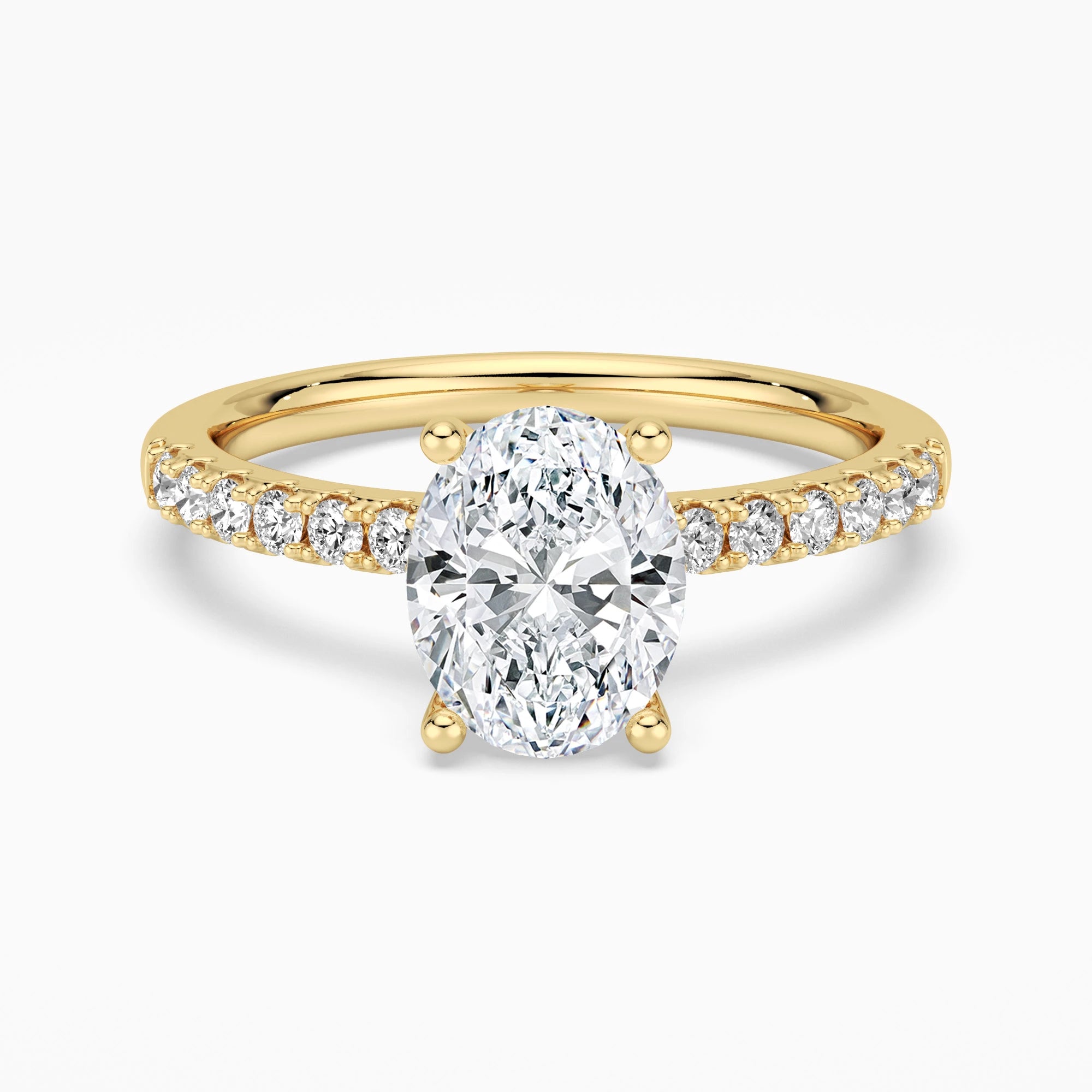 Petite Micropavé Oval Shaped Moissanite Engagement Ring