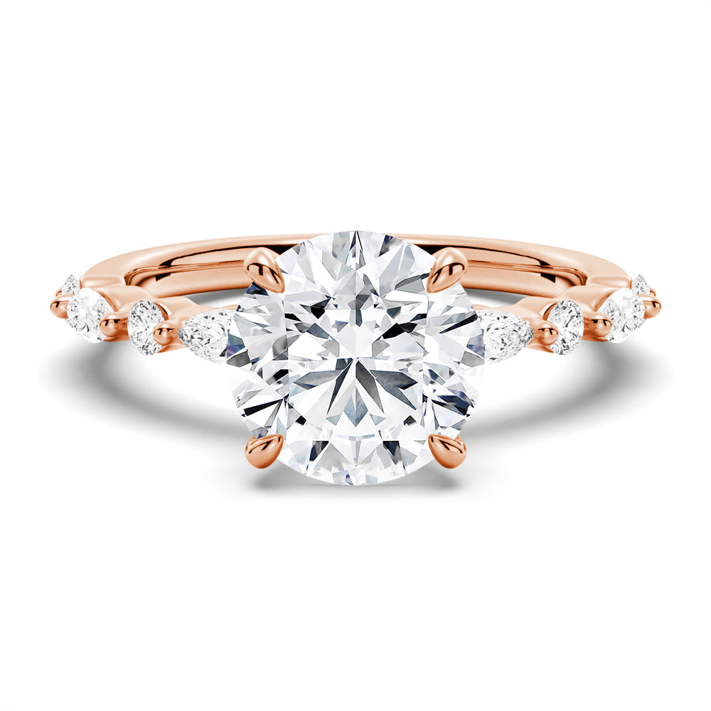 Unique Round Cut Engagement Ring With Marquise Accents