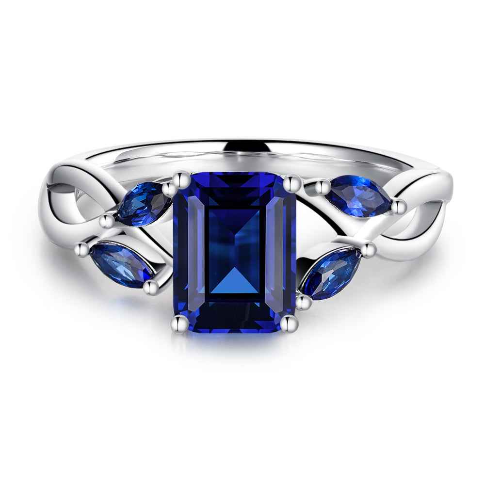 2 CT. Emerald Cut Lab Grown Sapphire Ring with Marquise Sapphire Accents