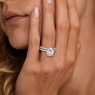 Micropavé Oval Hidden Halo Moissanite Ring Set with Matching Wedding Band