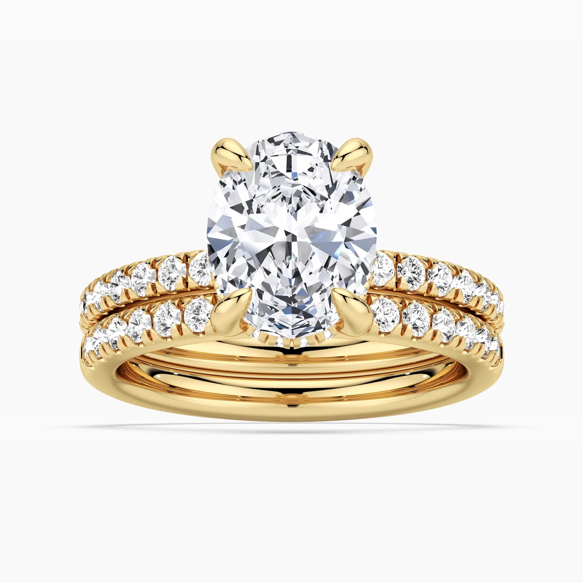 Micropavé Oval Hidden Halo Moissanite Ring Set with Matching Wedding Band