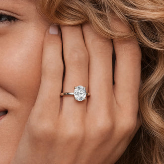 Four Prongs Oval Solitaire Moissanite Engagement Ring