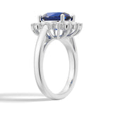 2 CT. Oval Sapphire Ring with Sunburst Diamond Halo