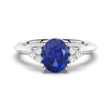 2.5 CT. Oval Sapphire Ring with Trio White Sapphire Accents