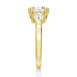 Double Prong Round Cut Engagement Ring with Tapered Baguette Stones