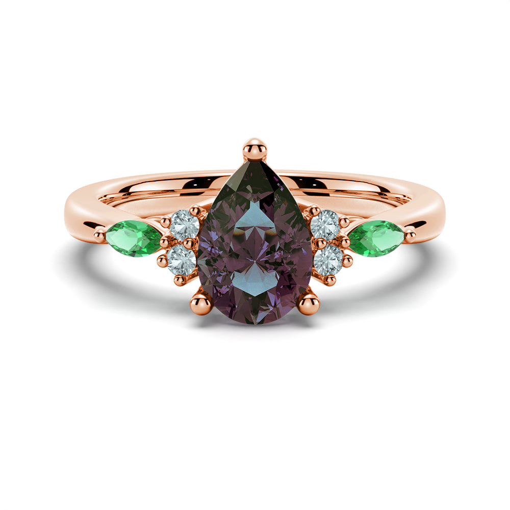 1.5 CT. Pear Shaped Alexandrite Engagement Ring With Emerald Accents