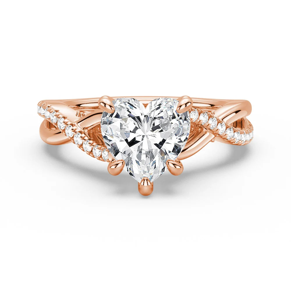 Heart Shaped Moissanite Twisted Band Engagement Ring with Hidden Accents