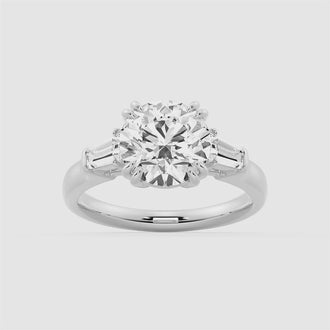 Round Cut Moissanite Engagement Ring with Tapered Baguette Side Stones