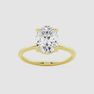 Four Prongs Oval Solitaire Moissanite Engagement Ring
