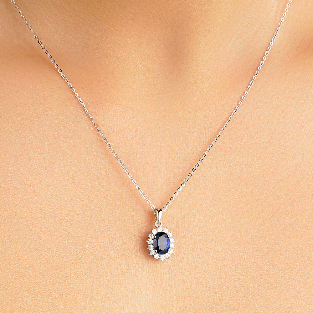 1.64 CT. Floral Halo Oval Sapphire Pendant