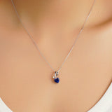 1 CT. Heart-Shaped Sapphire Ribbon Pendant with Diamond