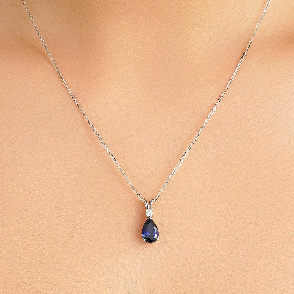 1.7 CT. Pear Blue Sapphire Solitaire Pendant with White Sapphire