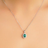 1.64 CT. Floral Halo Oval Emerald Pendant