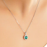 1.64 CT. Floral Halo Oval Emerald Pendant