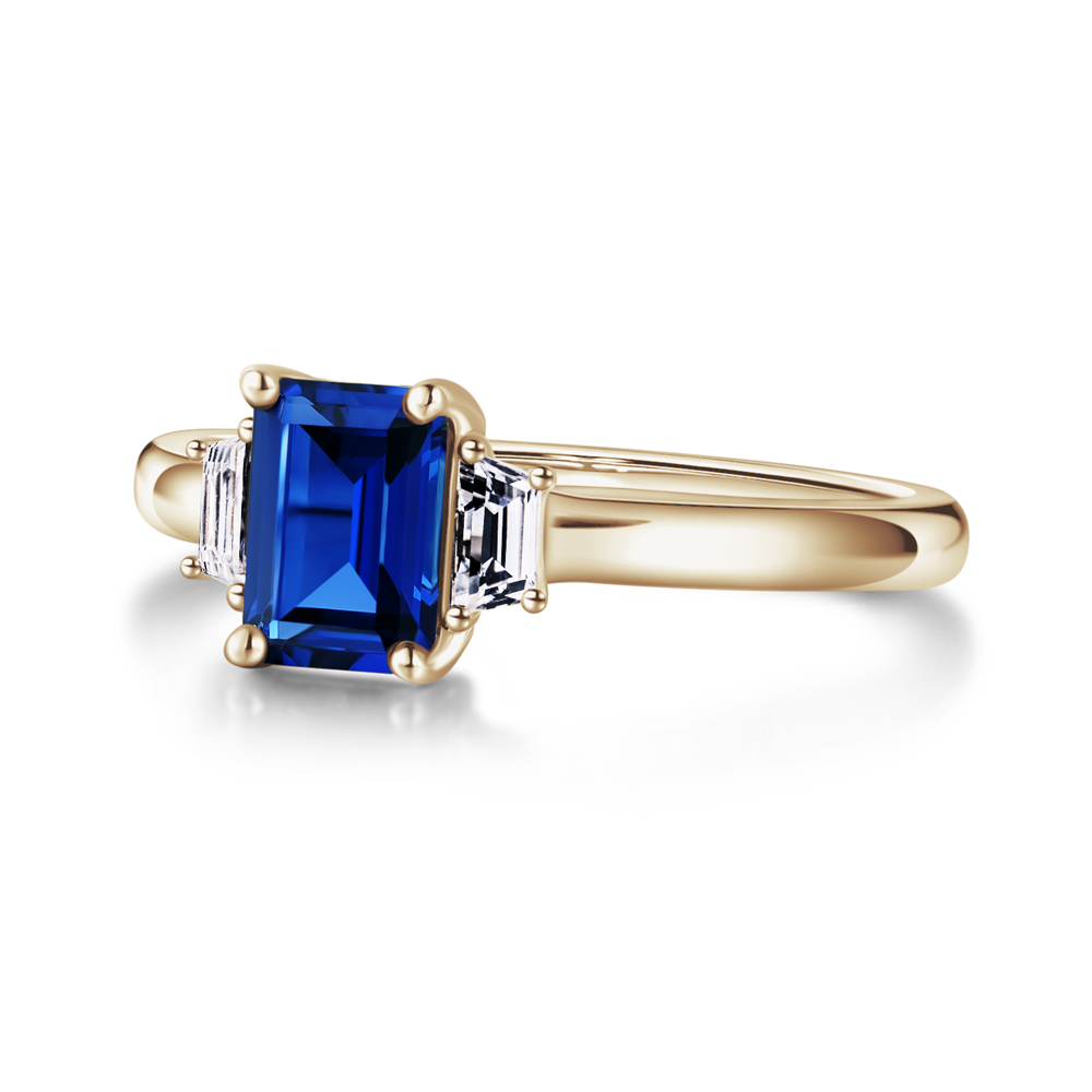3 CT. Emerald Cut Blue Sapphire and White Sapphire Three Stone Ring ...