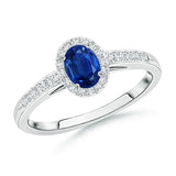1.5 CT. Oval Blue Sapphire and White Sapphire Halo Micropavé Ring