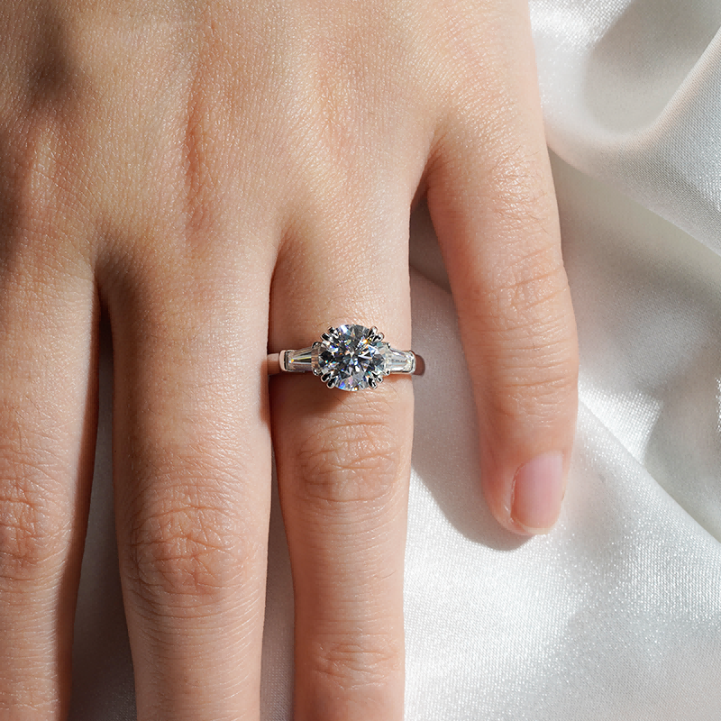 Round-Cut Moissanite Engagement Ring with Tapered Baguette Side Stones