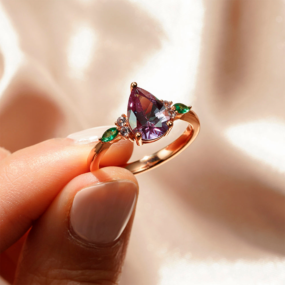 1.5 CT. Pear Shaped Alexandrite Engagement Ring With Emerald Accents
