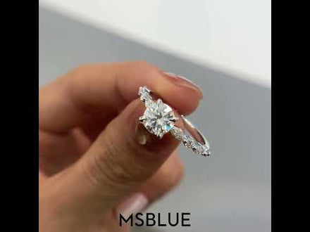 Unique Round Cut Engagement Ring With Marquise Accents